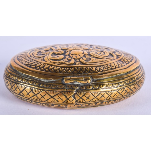 2024 - AN 18TH/19TH CENTURY INDIAN BRASS BUDDHISTIC SNUFF BOX. 7 cm x 5.25 cm.