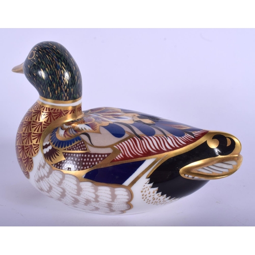 204 - Royal Crown Derby paperweight of a mallard, gold stopper, boxed. 9 cm high.