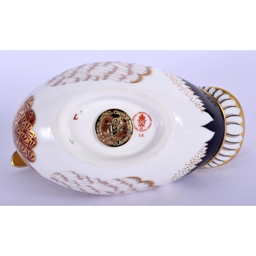 204 - Royal Crown Derby paperweight of a mallard, gold stopper, boxed. 9 cm high.