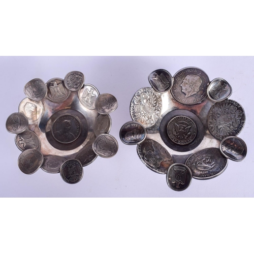 2041 - A PAIR OF CONTINENTAL SILVER COIN DISHES. 354 grams. 11 cm wide.