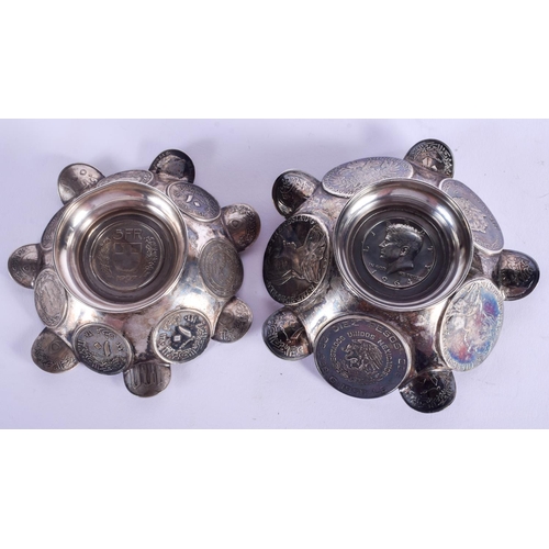 2041 - A PAIR OF CONTINENTAL SILVER COIN DISHES. 354 grams. 11 cm wide.