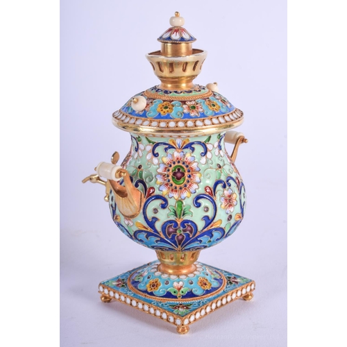 2071 - A CONTINENTAL SILVER AND ENAMEL SAMOVAR painted with flowers. 156 grams. 12 cm x 6 cm.