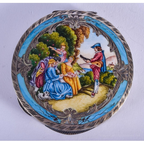 2072 - AN EARLY 20TH CENTURY EUROPEAN SILVER AND ENAMEL COMPACT. 91 grams. 6.5 cm diameter.