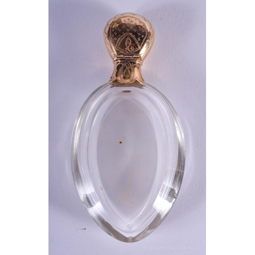 2084 - AN ANTIQUE 18CT GOLD MOUNTED GLASS SCENT BOTTLE. 9.5 cm high.