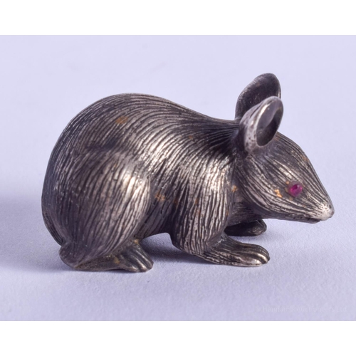 2097 - A SMALL CONTINENTAL SILVER FIGURE OF A MOUSE with ruby eyes. 59 grams. 3 cm x 2 cm.