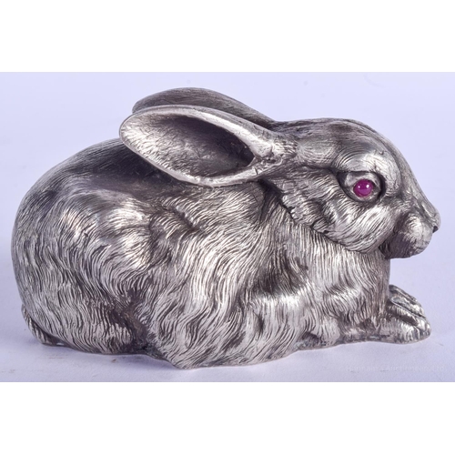 2099 - A LARGE CONTINENTAL SILVER FIGURE OF A RABBIT with ruby eyes. 107 grams. 10 cm x 7 cm.