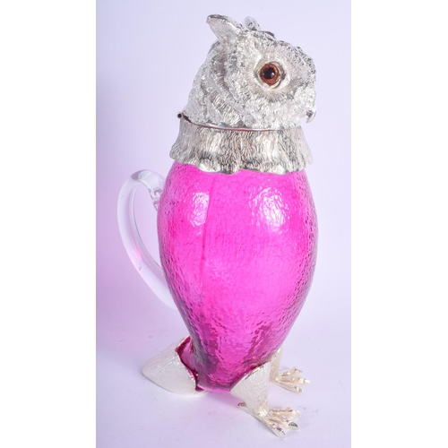 2125 - A CONTEMPORARY SILVER PLATED OWL CLARET JUG. 29 cm high.