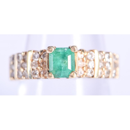 2143 - A 14CT GOLD DIAMOND AND EMERALD RING. 5.5 grams. N/O.