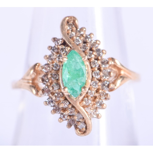 2144 - A 14CT GOLD DIAMOND AND EMERALD RING. 4.3 grams. N.