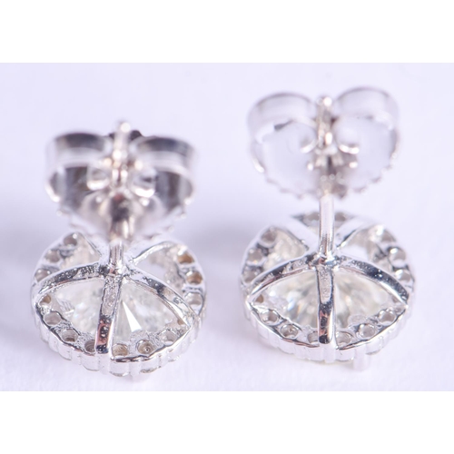 2145 - A PAIR OF 18CT WHITE GOLD AND DIAMOND EARRINGS of approx 2cts. 2.2 grams.