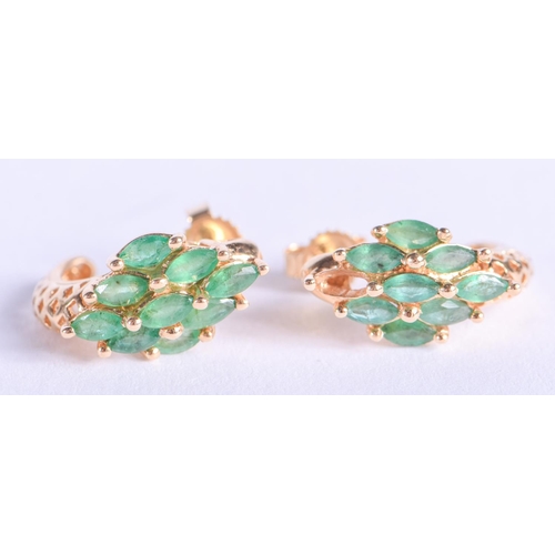 2149 - A PAIR OF GOLD AND EMERALD EARRINGS. 3.1 grams.