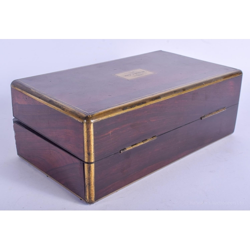 2151 - A GOOD MID 19TH CENTURY ENGLISH ROSEWOOD BRASS BOUND TRAVELLING BOX. London 1843. 22 cm x 14 cm.