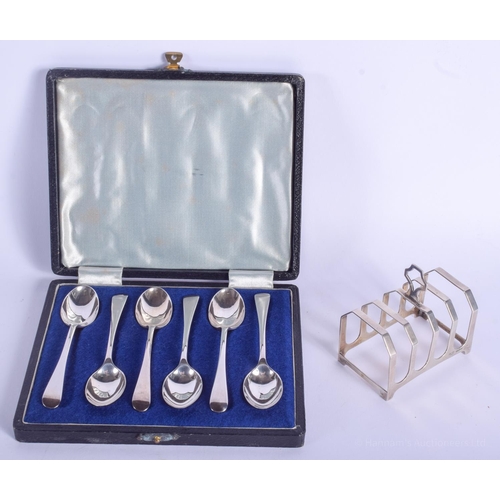 2153 - SIX SILVER TEASPOONS and a silver toast rack. Sheffield 1944 & Birmingham 1933. 130 grams. (7)