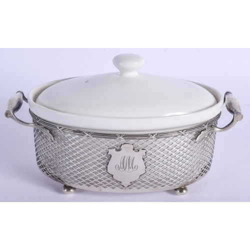 2156 - A VINTAGE STERLING SILVER TWIN HANDLED CROCK HOLDER. Silver 237 grams. 24 cm x 12 cm.