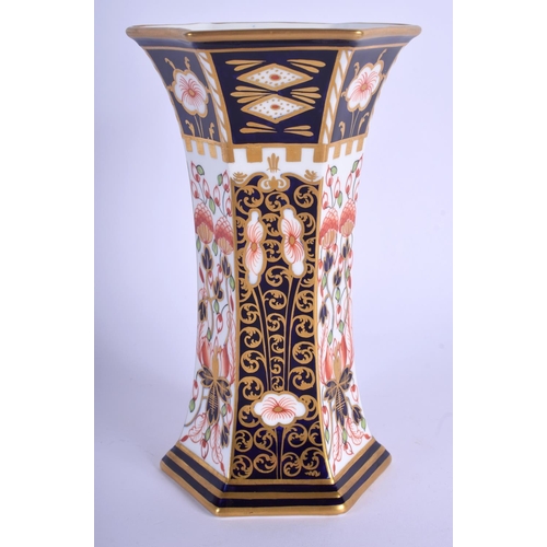 216 - Royal Crown Derby hexagonal vase painted with pattern 6299 date code 1908. 16 cm high