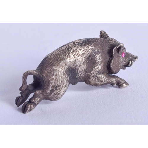 2169 - A SMALL CONTINENTAL SILVER HOG with ruby eyes. 16 grams. 3 cm x 0.5 cm.