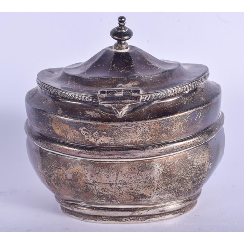 2171 - A GEORGE III STYLE SILVER TEA CADDY. 156 grams. 9 cm wide.