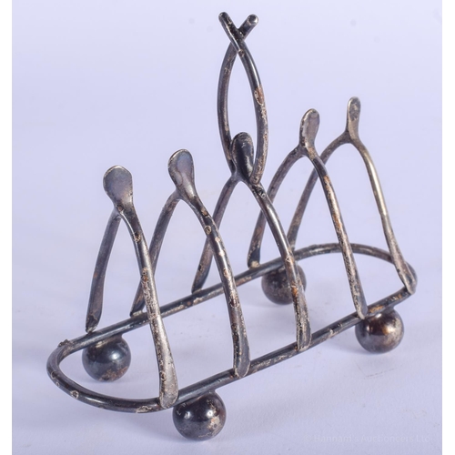 2172 - A VINTAGE SILVER WISHBONE TOAST RACK. 64 grams. 11 cm wide.