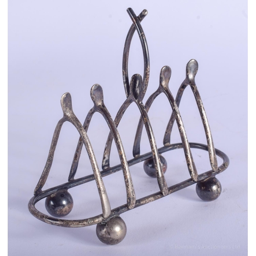 2172 - A VINTAGE SILVER WISHBONE TOAST RACK. 64 grams. 11 cm wide.