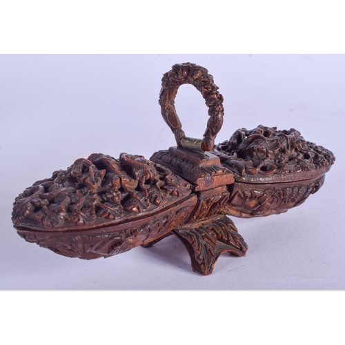 2176 - A GOOD 19TH CENTURY CONTINENTAL CARVED FRUIT COQUILLA NUT SNUFF BOX with double ends. 15 cm x 4 cm.