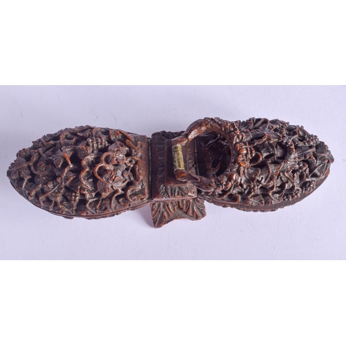 2176 - A GOOD 19TH CENTURY CONTINENTAL CARVED FRUIT COQUILLA NUT SNUFF BOX with double ends. 15 cm x 4 cm.