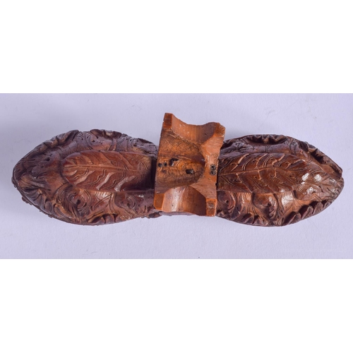 2176 - A GOOD 19TH CENTURY CONTINENTAL CARVED FRUIT COQUILLA NUT SNUFF BOX with double ends. 15 cm x 4 cm.