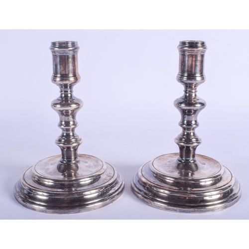 2187 - A STYLISH PAIR OF FRENCH CHRISTOFLE SILVER PLATED CANDLESTICKS. 18 cm high.