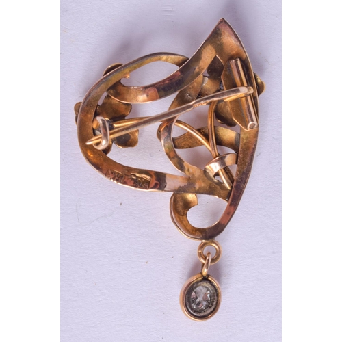 2193 - AN ANTIQUE GOLD AND DIAMOND BROOCH. 5.3 grams. 4.2 cm x 3 cm.