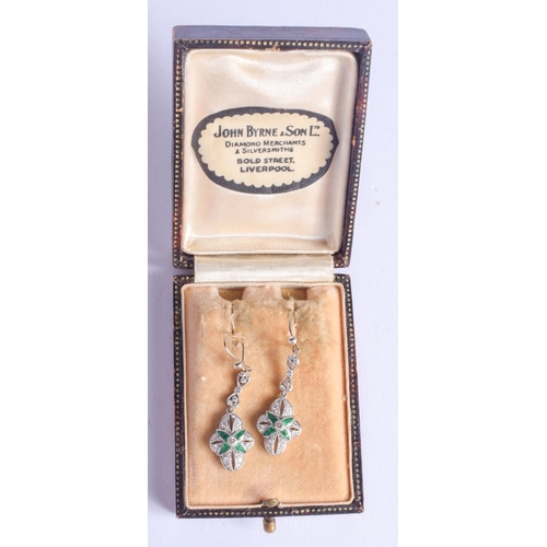 2196 - A PAIR OF ART DECO PLATINUM DIAMOND AND EMERALD EARRINGS. 5.1 grams. 3.5 cm long.