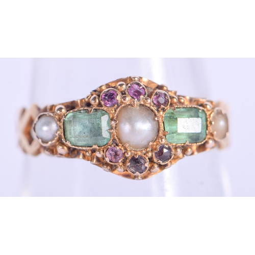 2199 - AN ANTIQUE 18CT GOLD EMERALD AND SEED PEARL RING. 1.8 grams. M.