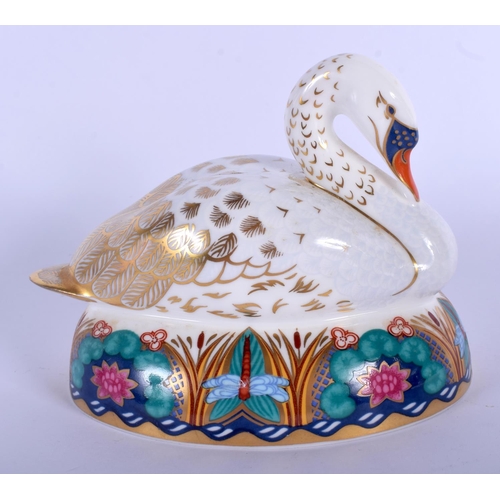 220 - Royal Crown Derby paperweight of a swan, gold stopper, boxed. 9.5cm high