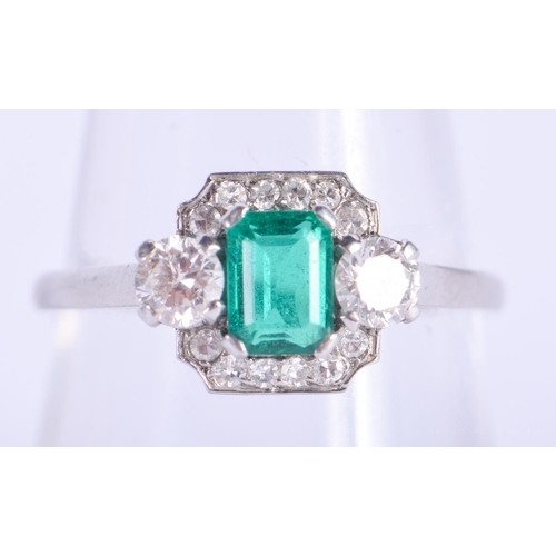 2204 - A FINE ART DECO PLATINUM EMERALD AND DIAMOND RING. 3.5 grams. O/P.