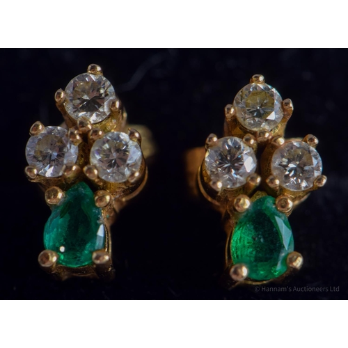 2207 - A PAIR OF GOLD DIAMOND AND EMERALD EARRINGS. 2.5 grams. 1 cm long.