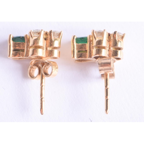 2207 - A PAIR OF GOLD DIAMOND AND EMERALD EARRINGS. 2.5 grams. 1 cm long.