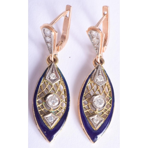 2213 - A PAIR OF ART DECO 14CT GOLD DIAMOND AND EMERALD EARRING. 6.5 grams. 2.5 cm long.