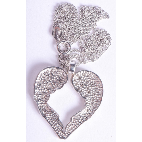 2214 - A LOVELY PLATINUM AND DIAMOND DOUBLE WING ANGEL NECKLACE. 10.6 grams. Pendant 2.8 cm x 1.8 cm.