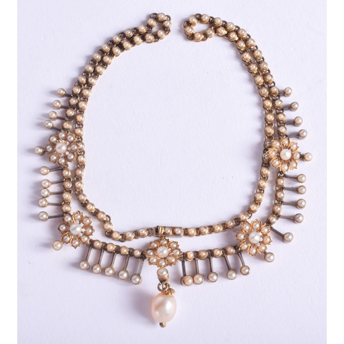 2215 - A GOOD 15CT GOLD AND PEARL FLORAL NECKLACE. 20 grams. 41 cm long.