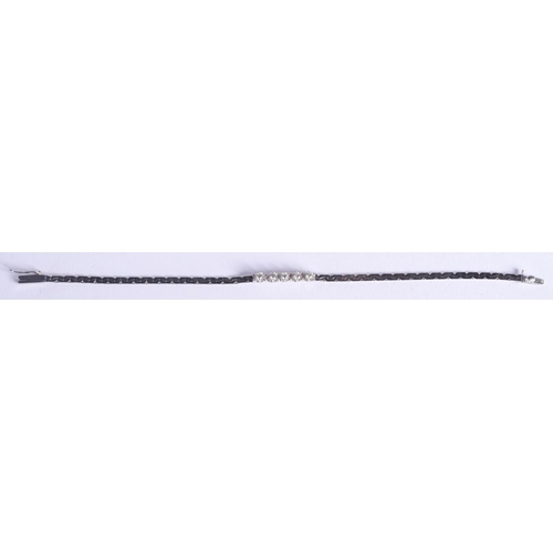 2221 - A 14CT WHITE GOLD AND DIAMOND BRACELET. 4.8 grams. 17 cm x 0.3 cm.