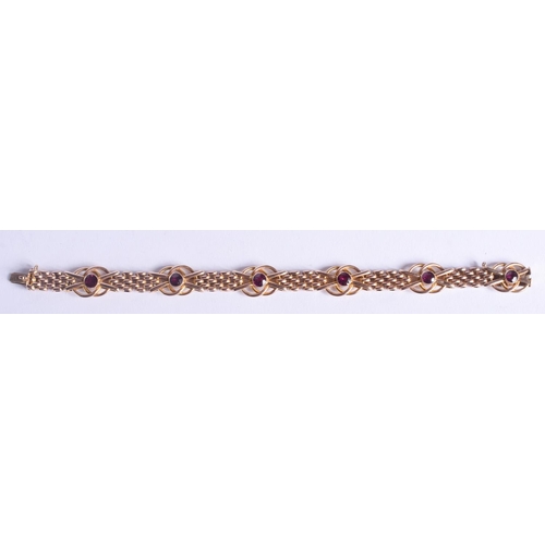 2224 - AN ANTIQUE 9CT GOLD AND AMETHYST BRACELET. 14.3 grams. 19.5 cm x 1.2 cm.