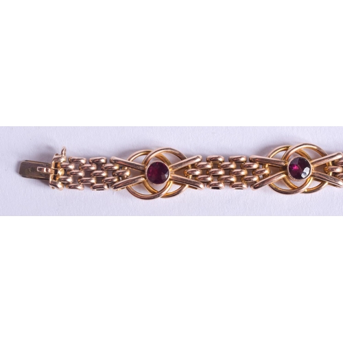 2224 - AN ANTIQUE 9CT GOLD AND AMETHYST BRACELET. 14.3 grams. 19.5 cm x 1.2 cm.