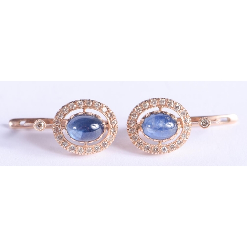 2226 - A PAIR OF 14CT GOLD DIAMOND AND SAPPHIRE EARRINGS. 6.2 grams. 1.8 cm long.