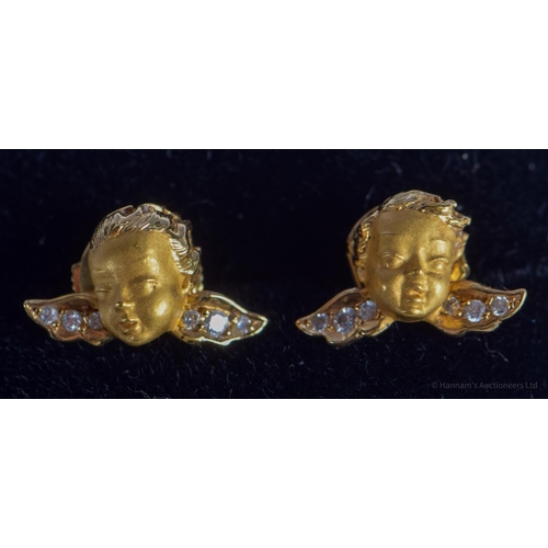 2227 - A PAIR OF 18CT GOLD AND DIAMOND CUPID EARRINGS. 3.8 grams. 1.4 cm x 0.8 cm.