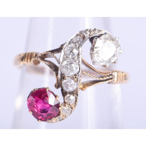 2228 - AN UNUSUAL GOLD DIAMOND AND RUBY TWIST RING. 3.2 grams. M/N.