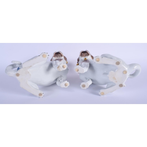 225 - A PAIR OF EARLY 20TH CENTURY DRESDEN PORCELAIN FIGURES OF PUG DOGS Meissen style. 21 cm x 13 cm.