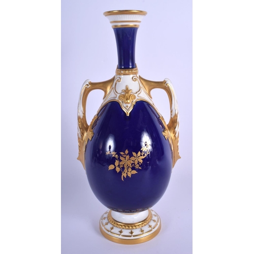 232 - Royal Worcester fine leadless glaze vase painted with flowers on a cobalt blue group date code for 1... 