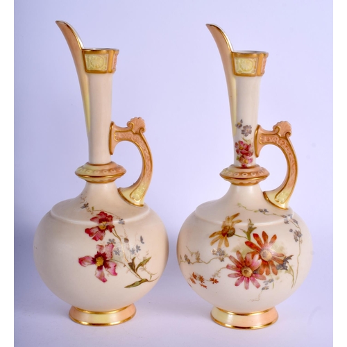 241 - Royal Worcester two shape 783 blush ivory ewers date code 1893 to both. 19 cm high