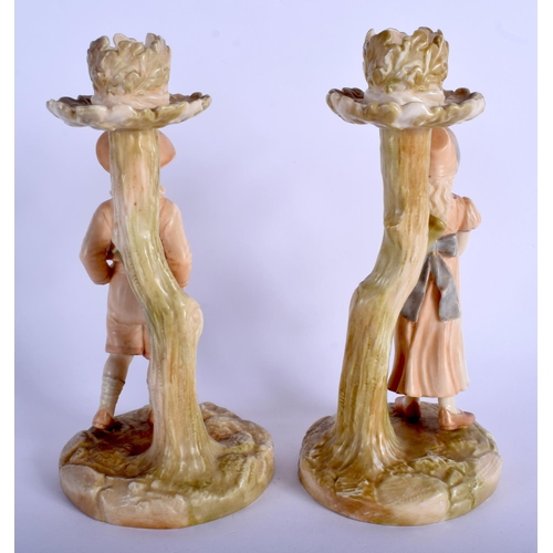 261 - Royal Worcester good Hadley pair of candle stick figures of a boy and girl date code for 1889. 19.5c... 