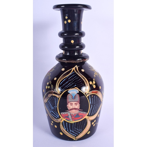 27 - A VINTAGE MIDDLE EASTERN GLASS HOOKAH PIPE BASE decorated with portraits of royalty, painted with fl... 