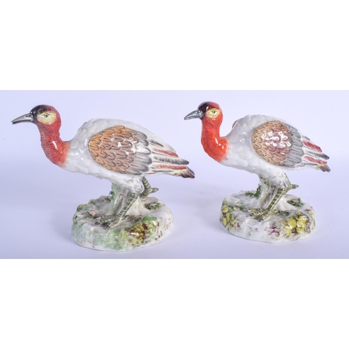 288 - A PAIR OF 19TH CENTURY CONTINENTAL PORCELAIN FIGURES OF BIRDS modelled upon naturalistic bases. 15 c... 