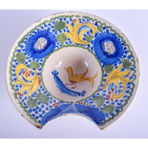 291 - A 19TH CENTURY FRENCH FAIENCE POTTERY BARBERS SHAVING BOWL painted with birds. 23 cm wide.